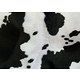 Tissu fausse fourrure imitation vache tâches noires / fond blanc